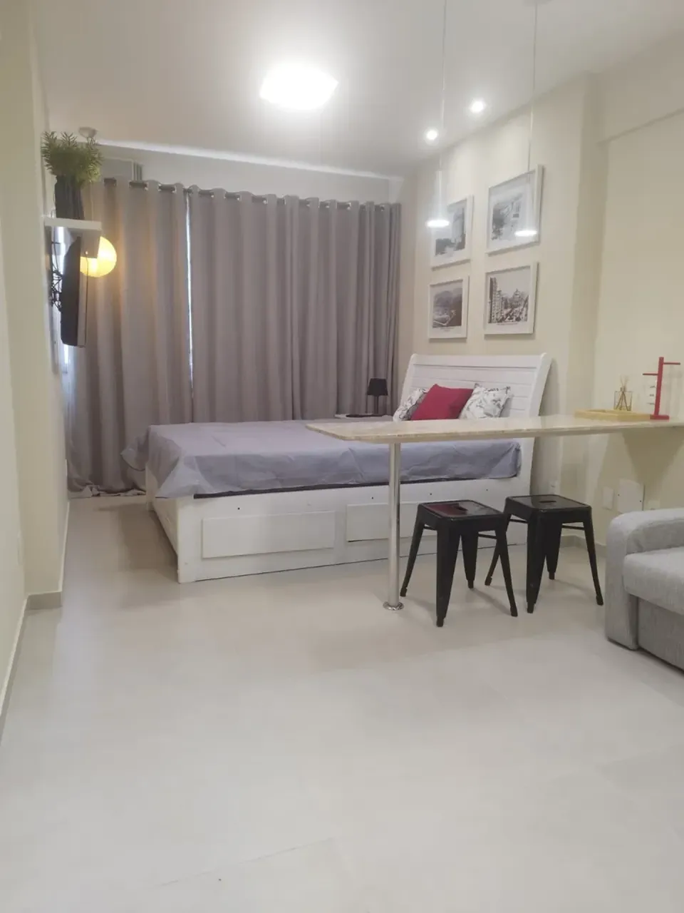 Furnished apartment with a compact cooking setup — photo 11
