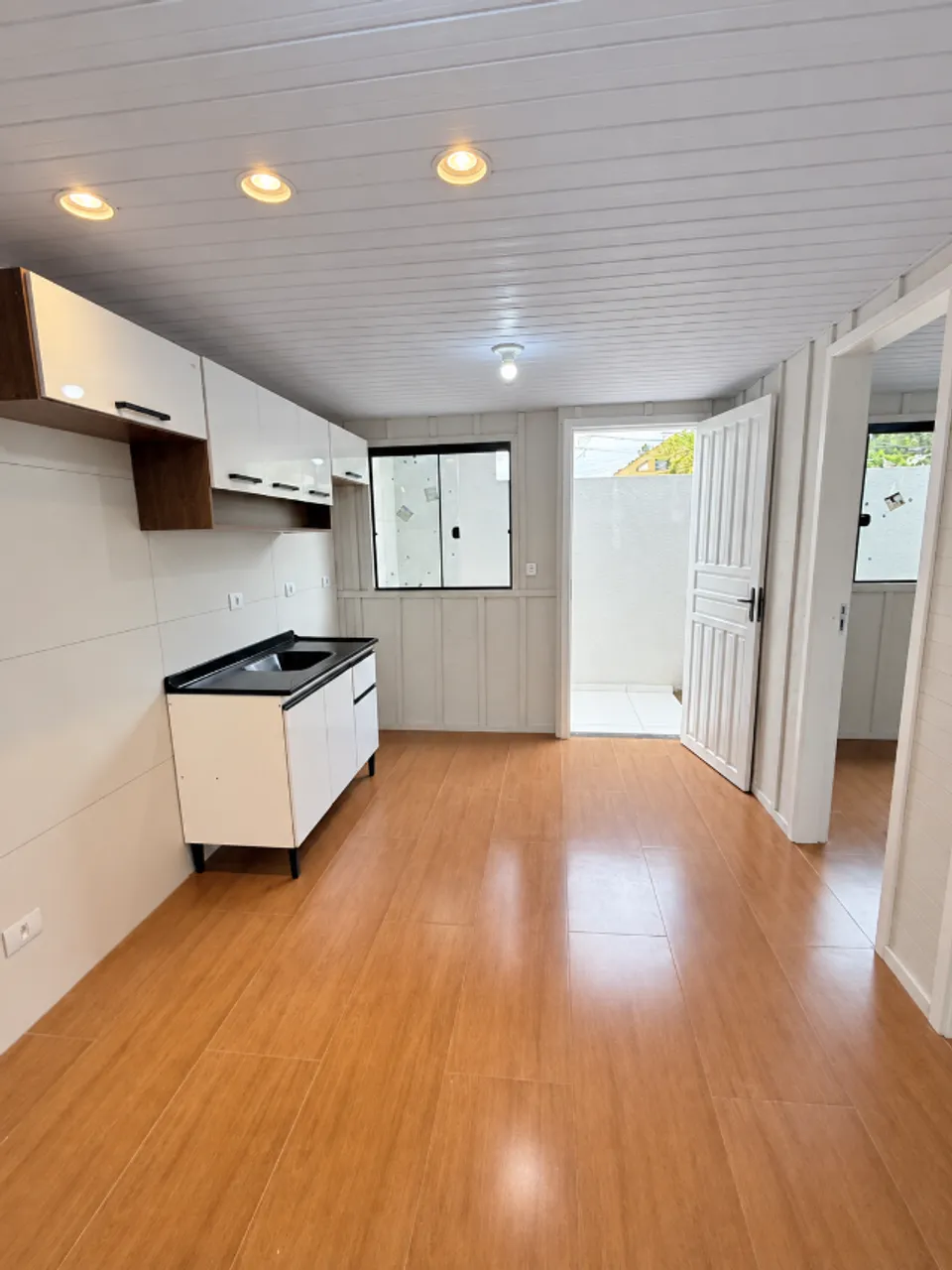 Wood or laminate floors in a 3-bedroom house, 55 m² — photo 8