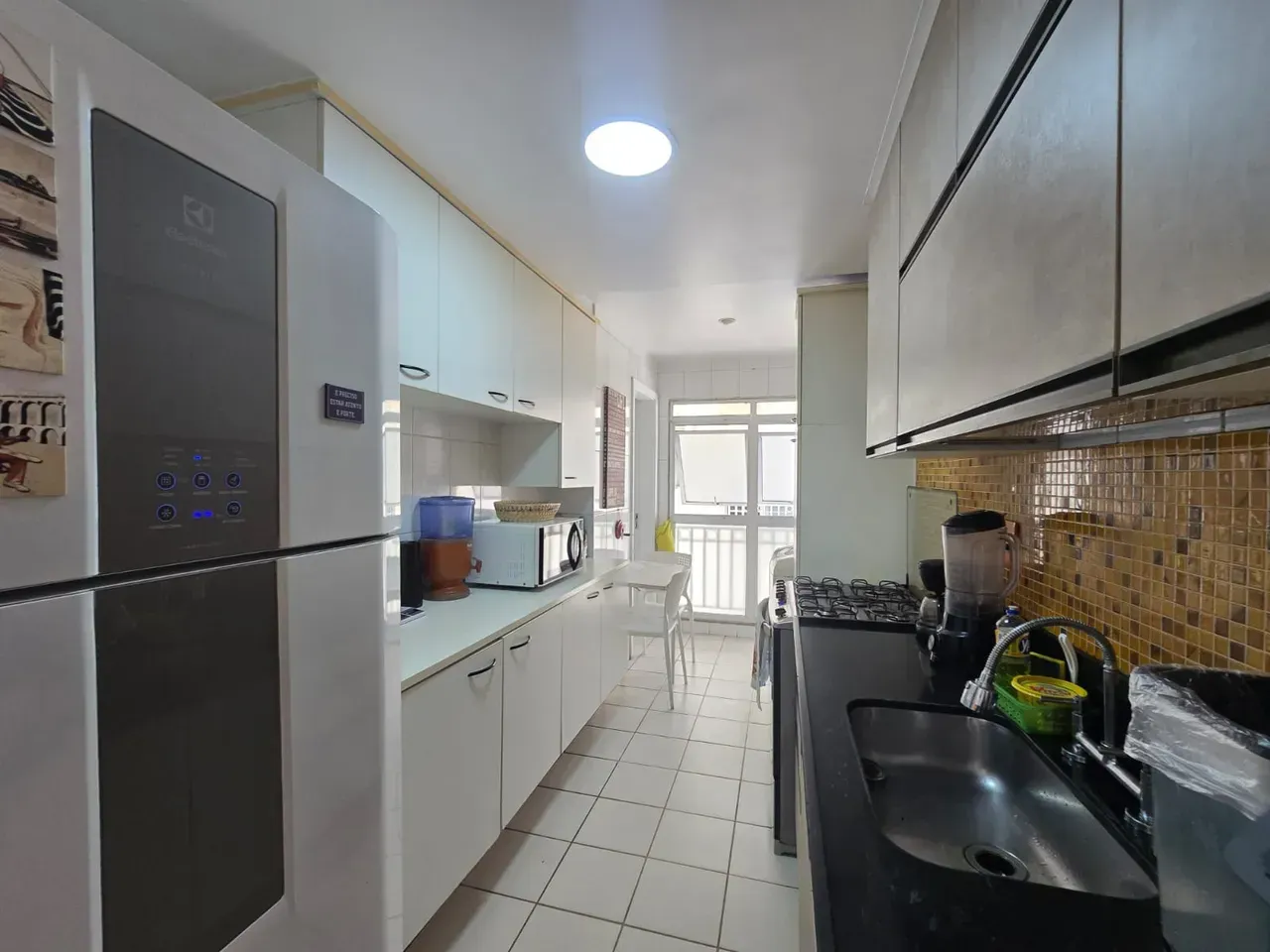 Furnished apartment with open-plan kitchen and terrace — photo 26
