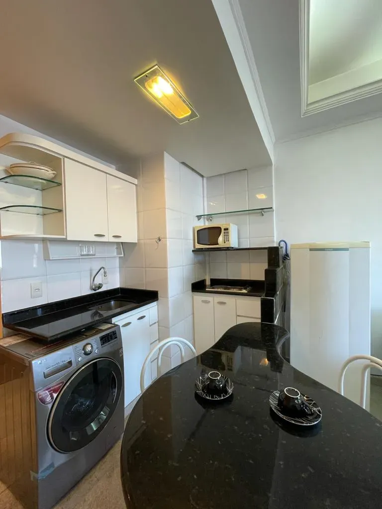 Apartment on the 10th floor with a washing machine — photo 9
