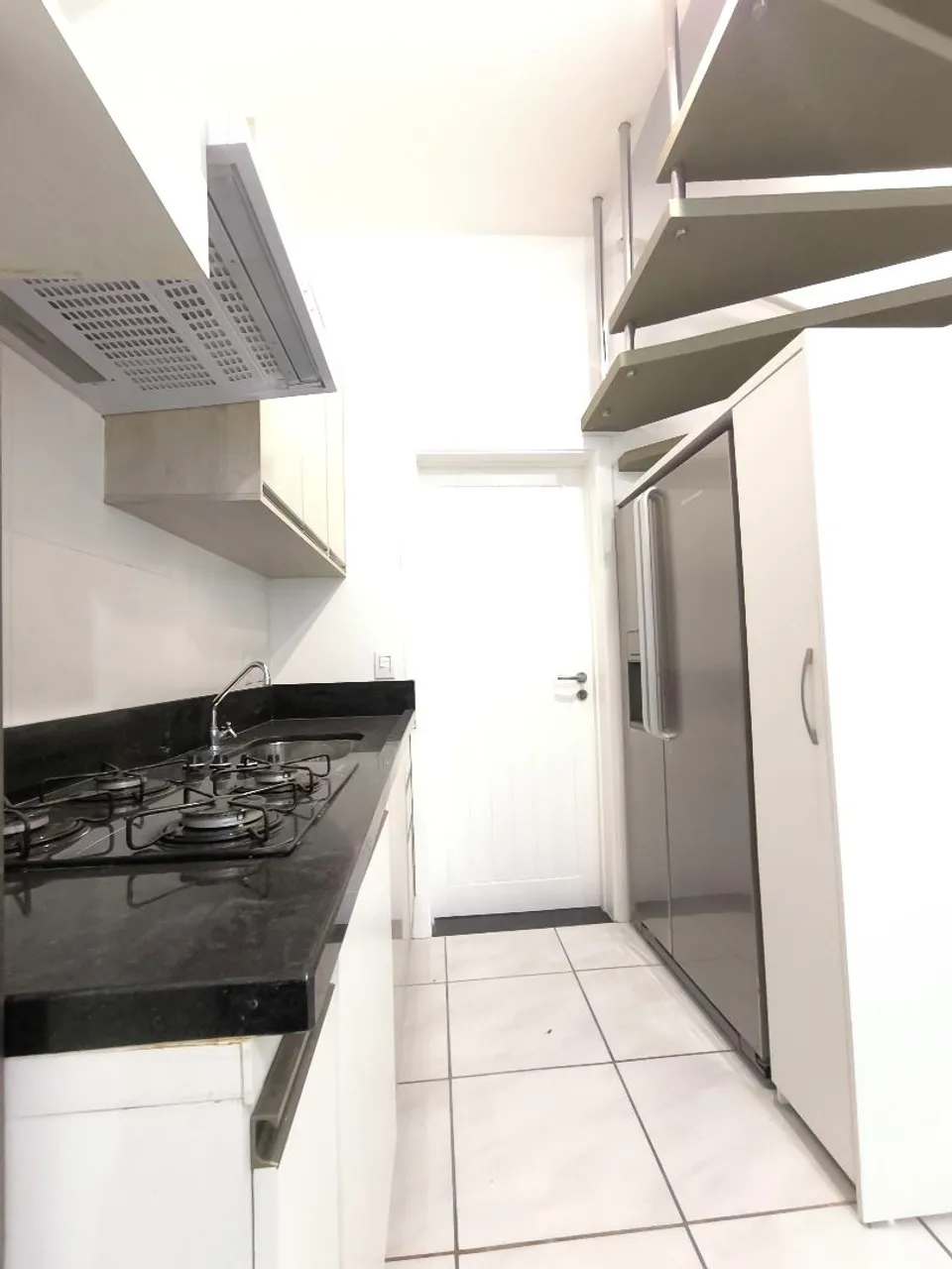 One-bedroom apartment in a building with a pool — photo 2