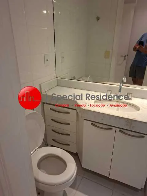 2-bedroom apartment in a building with a pool — photo 7