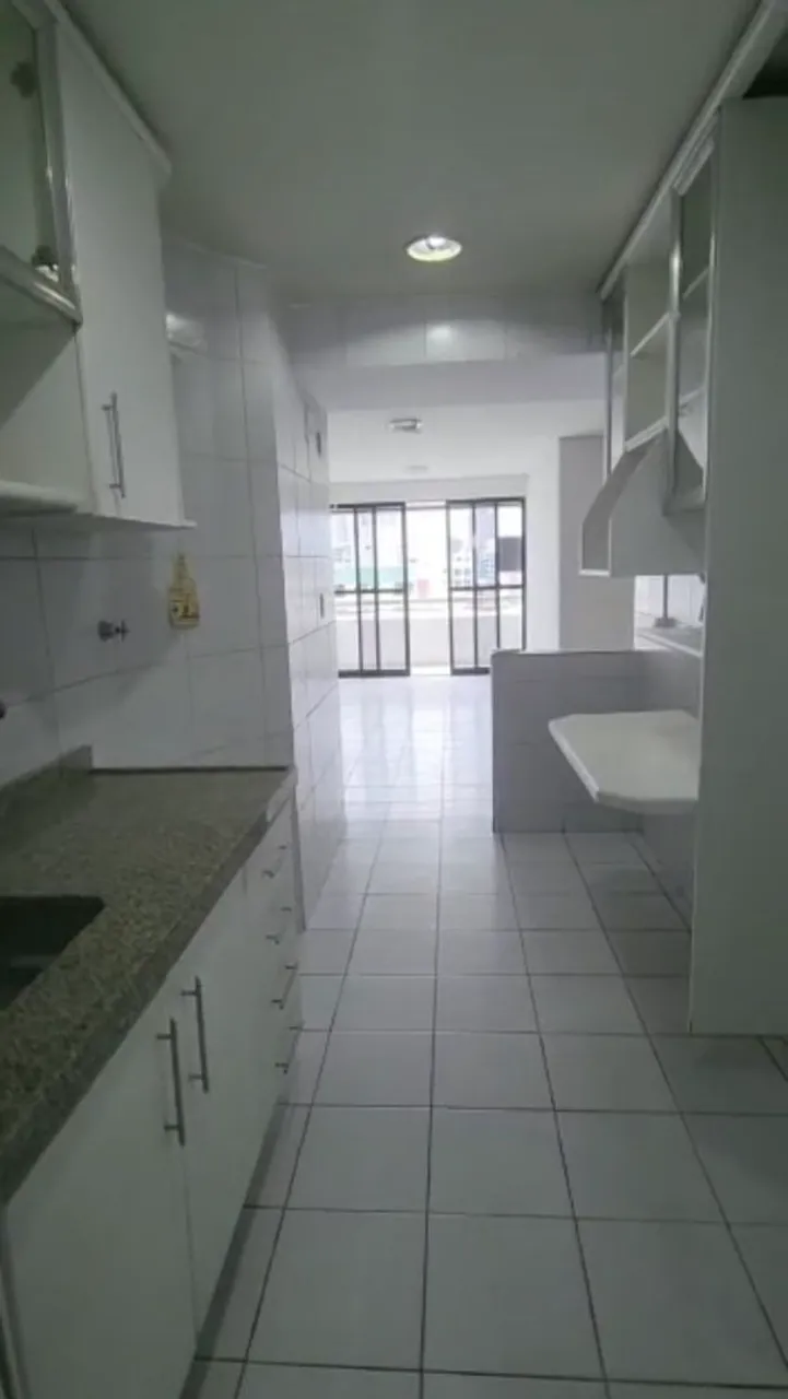 3-bedroom apartment in a building with a pool — photo 2