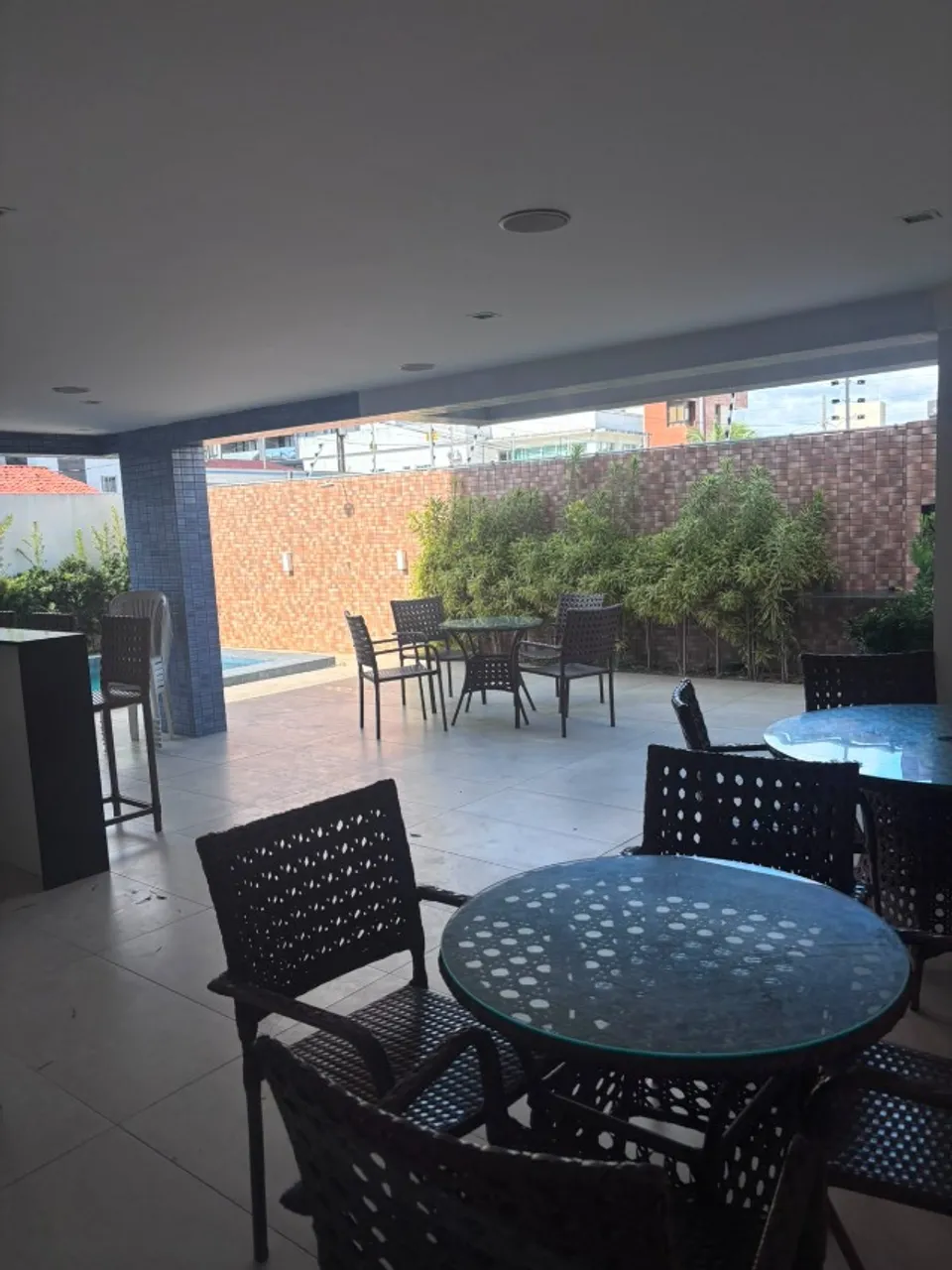 2-bedroom apartment in a building with a pool — photo 16