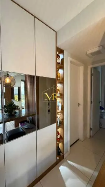 2-bedroom apartment in a building with a pool — photo 22