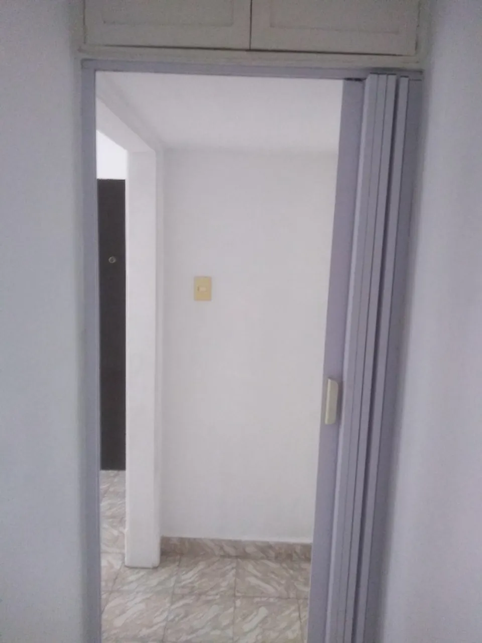 1-bedroom 1-bath apartment with a laundry area — photo 6