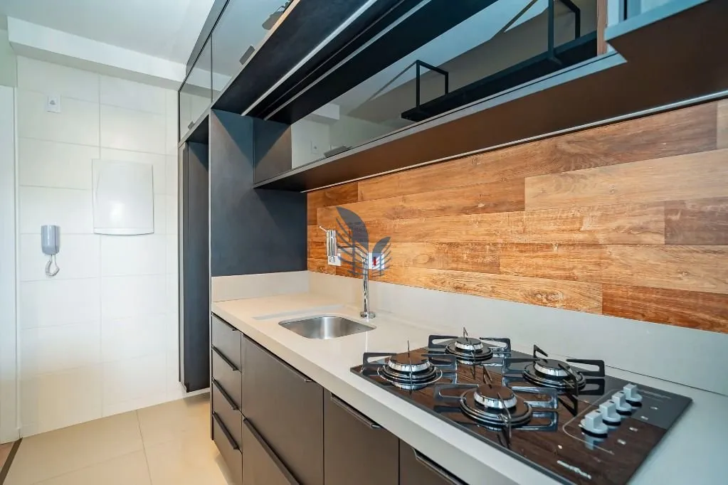 1-bedroom rental with open-plan kitchen and BBQ — photo 4