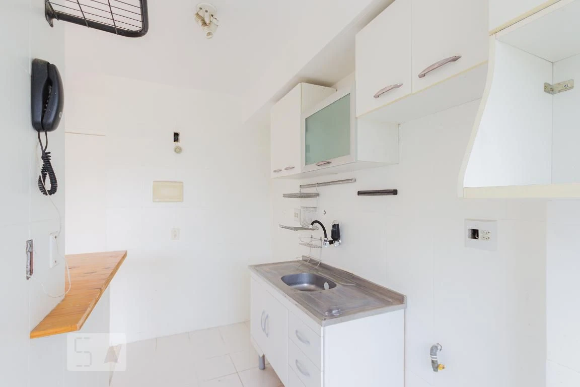 2-bedroom apartment in a building with a pool — photo 33