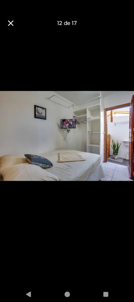 Furnished apartment with enclosed kitchen and gas stove