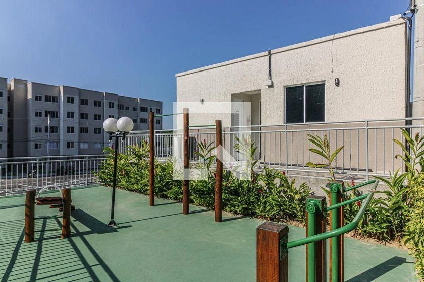 2-bedroom apartment in a building with a pool — photo 16