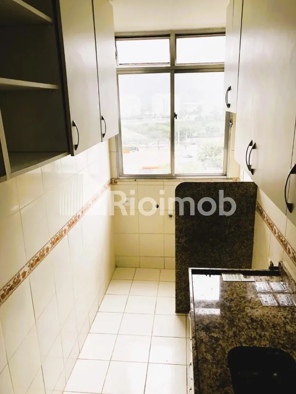 2-bedroom apartment in a building with a pool — photo 18