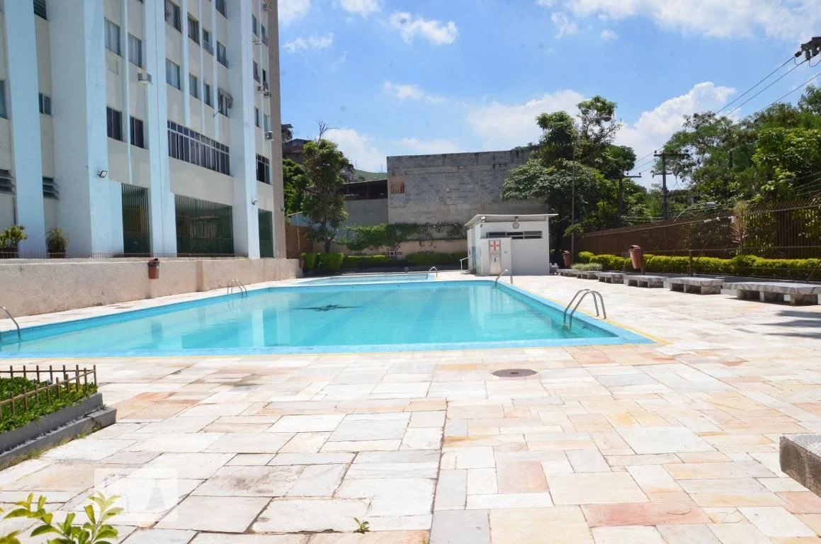 2-bedroom apartment in a building with a pool — photo 10