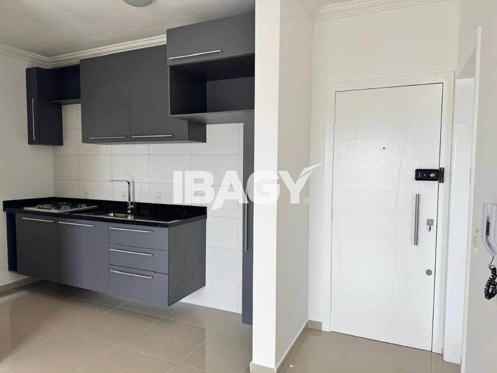 One-bedroom apartment in a building with a pool — photo 2