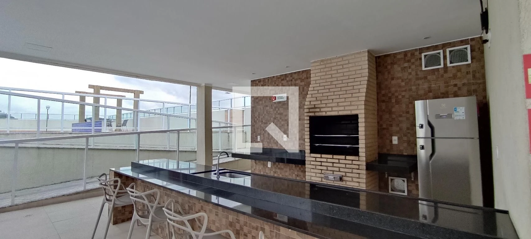 2-bedroom apartment in a building with a pool — photo 9
