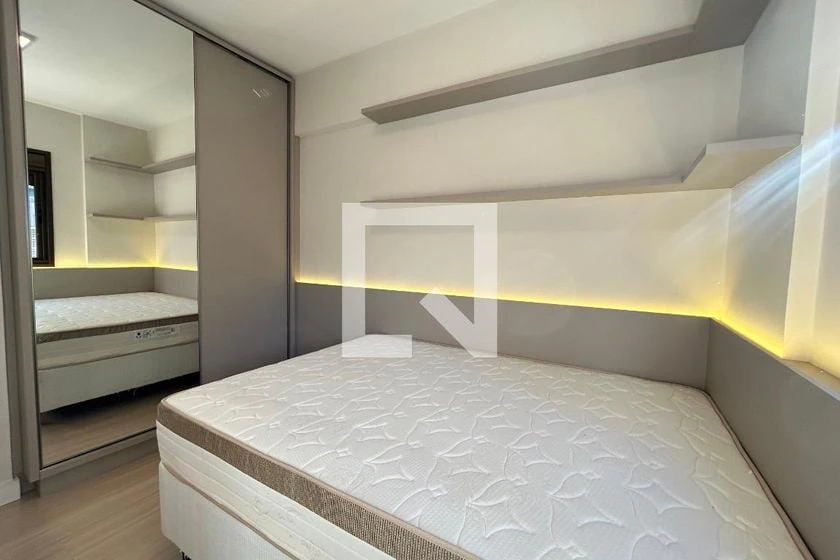 2-bedroom apartment in a building with a pool — photo 12