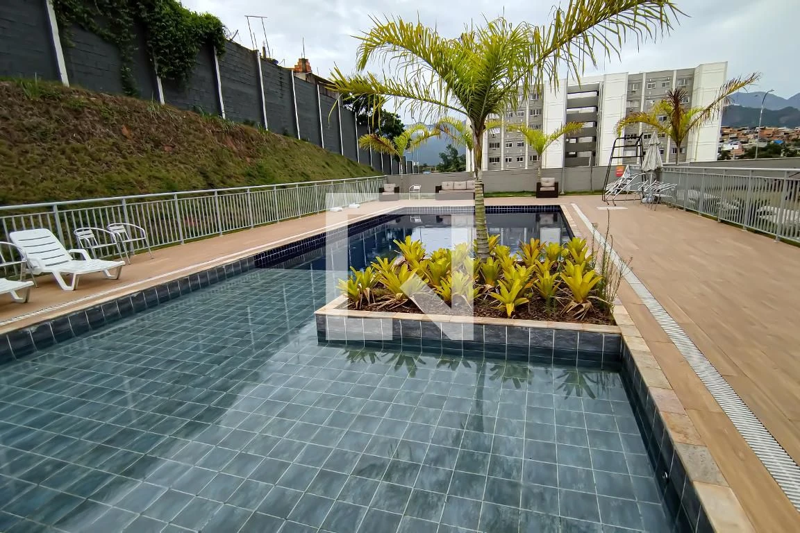2-bedroom apartment in a building with a pool — photo 2