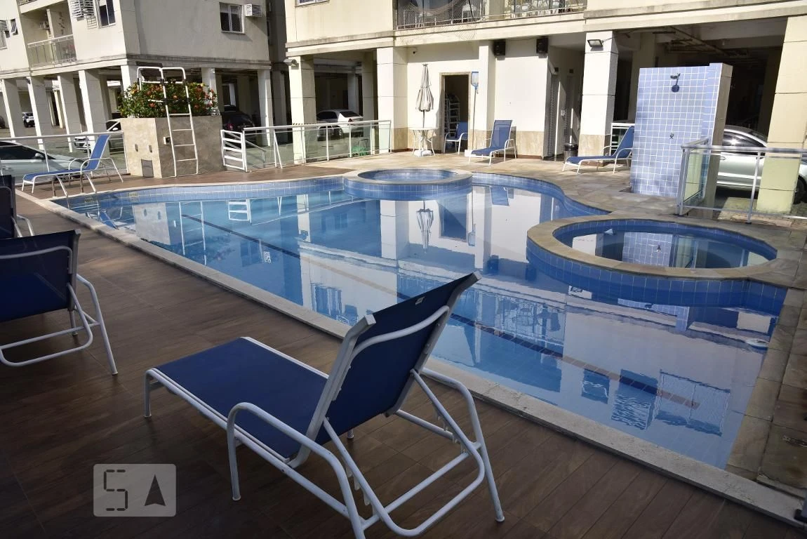 2-bedroom apartment in a building with a pool — photo 7