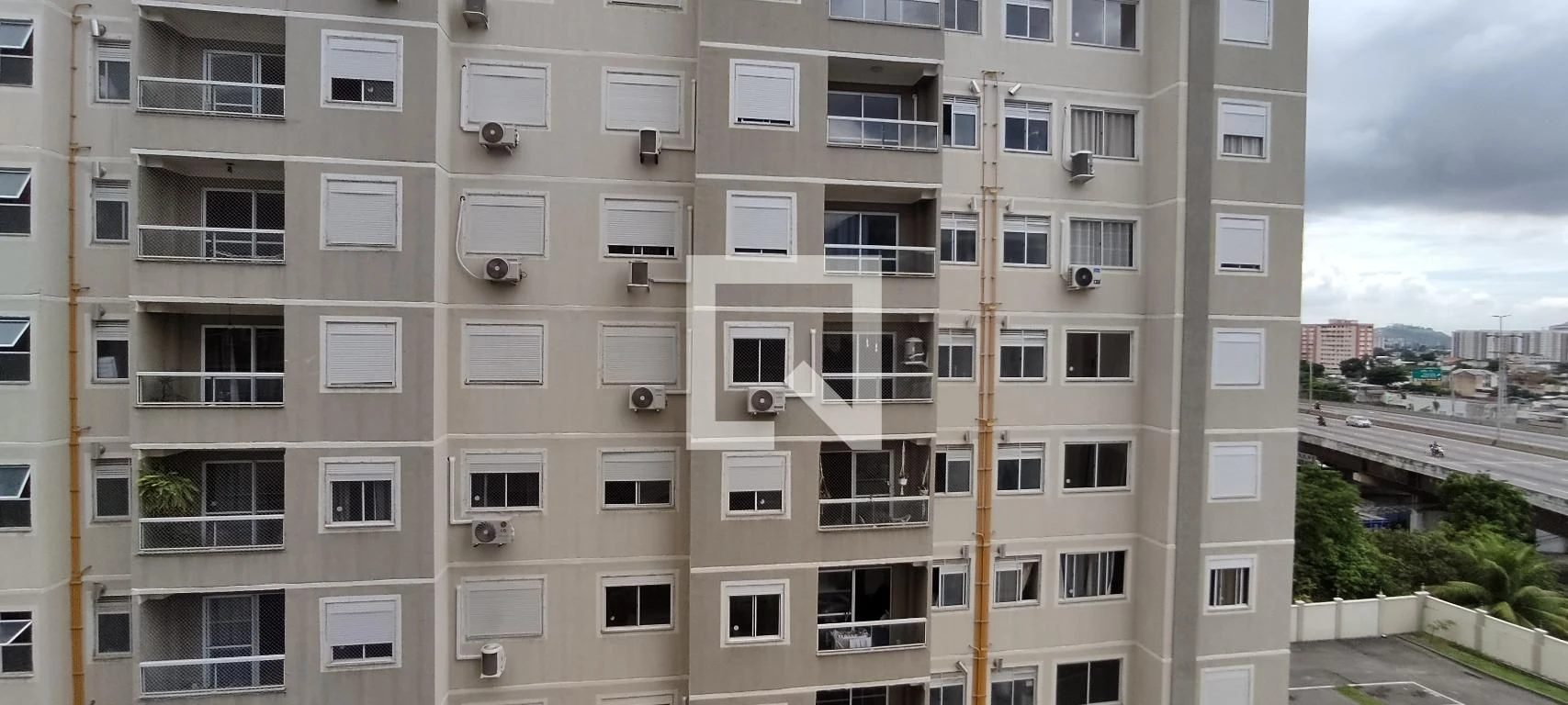 2-bedroom apartment in a building with a pool — photo 34