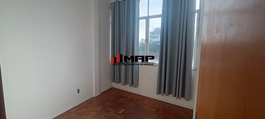 2-bedroom apartment with a compact kitchen and stove — photo 9