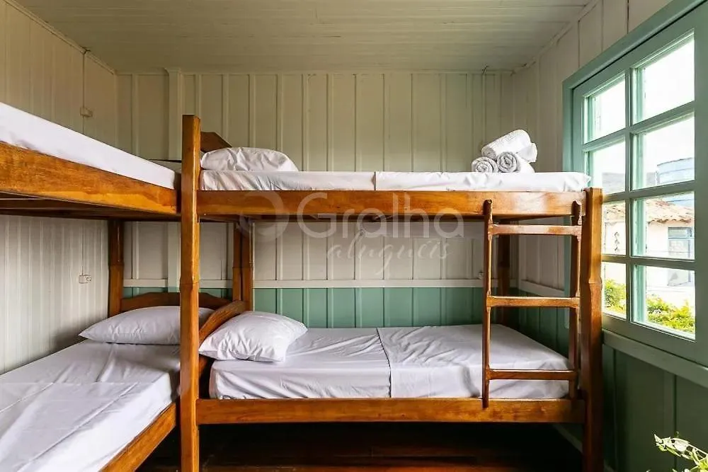 Casa com 6 quartos e churrasqueira na varanda — photo 8
