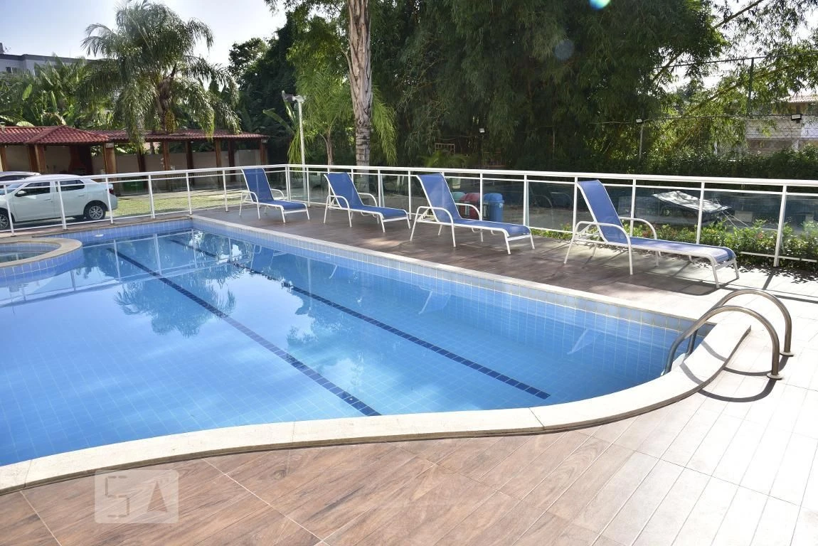 2-bedroom apartment in a building with a pool — photo 17