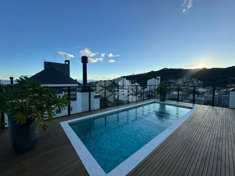 2-bedroom apartment in a building with a pool — photo 8