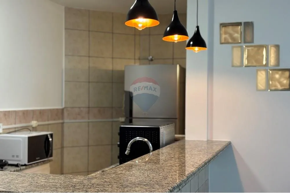Apartamento de 1 dormitório com sacada e churrasqueira — photo 4