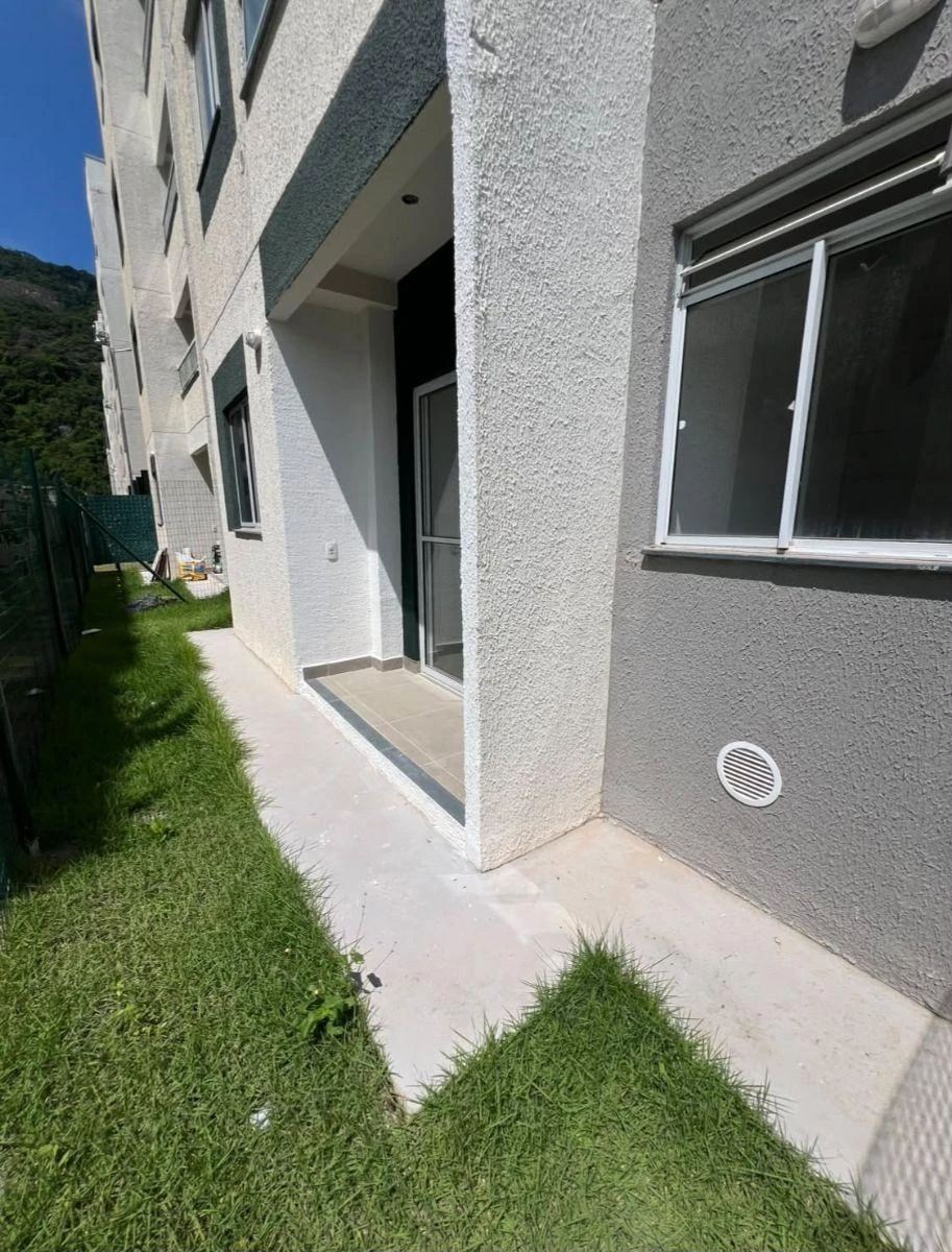 2-bedroom apartment in a building with a pool — photo 14