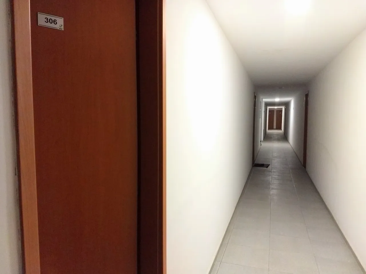 2-bedroom apartment in a building with a pool — photo 13