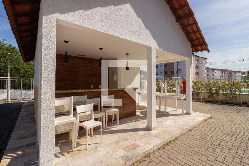 2-bedroom apartment in a building with a pool — photo 9