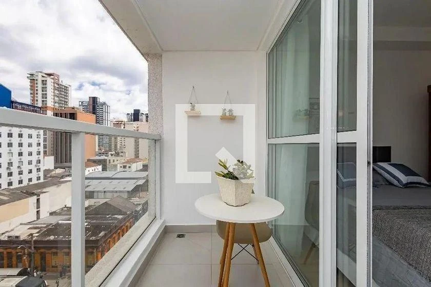 27 m² studio with a glass-enclosed balcony and a home office — photo 16