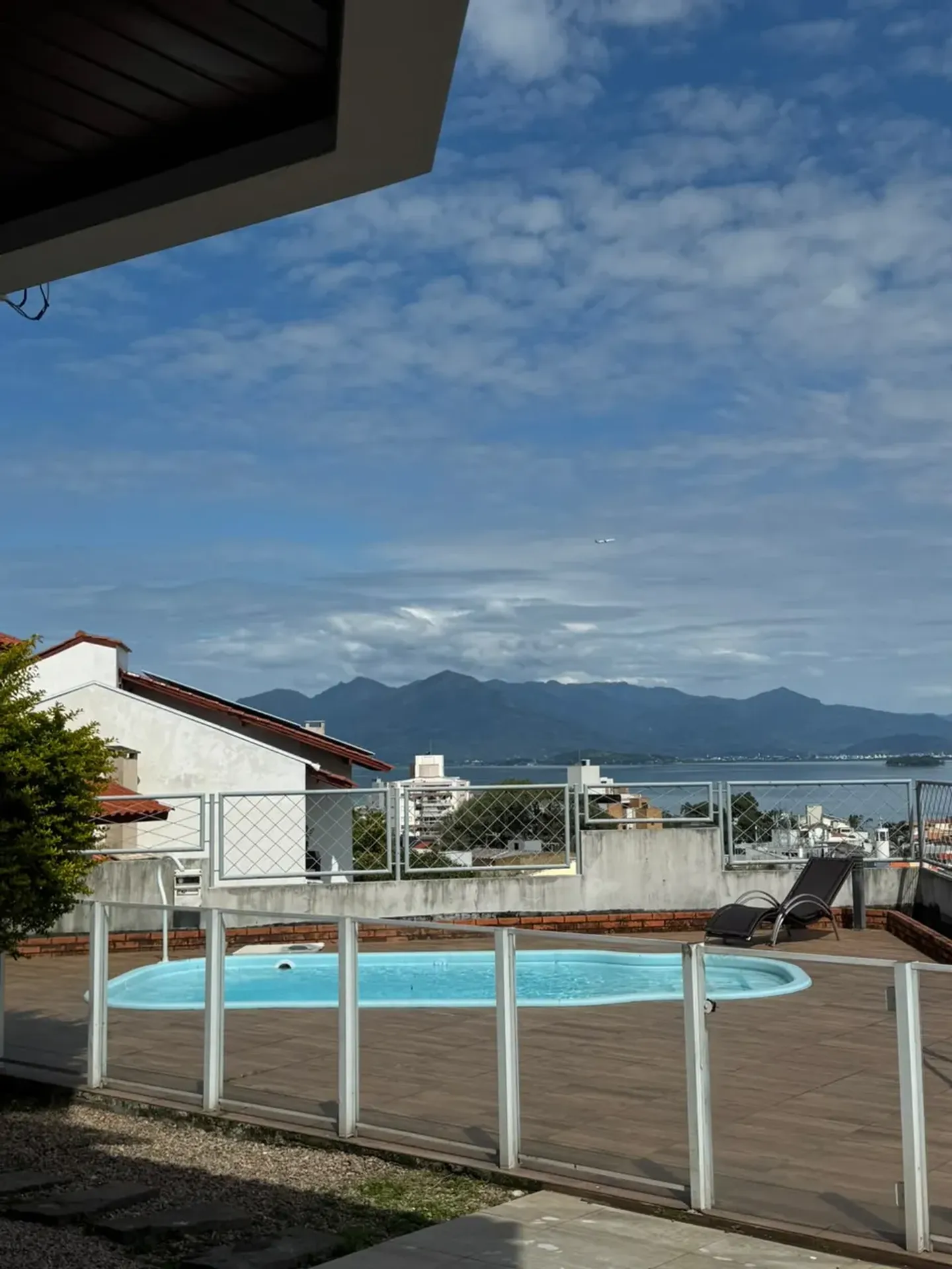 620 m² house with a glass-enclosed balcony and a water view — photo 10
