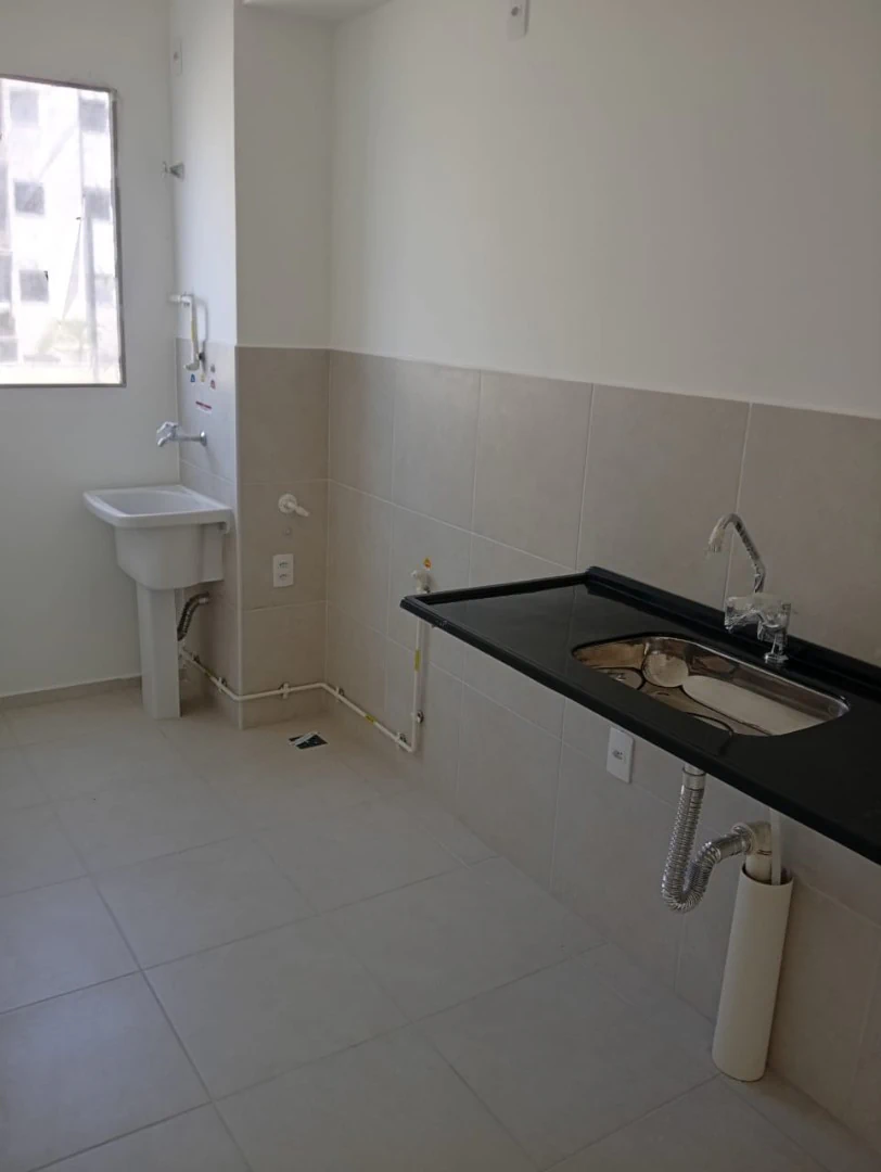 2-bedroom apartment in a building with a pool — photo 2