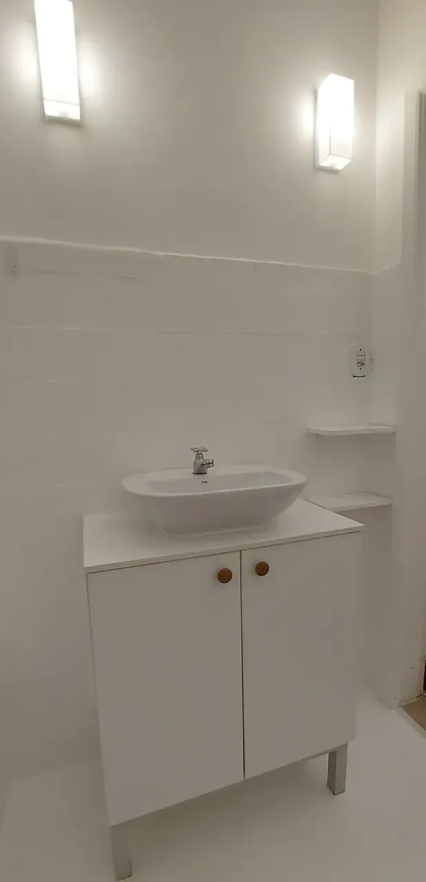 1-bedroom apartment with wood floors and glass shower — photo 12