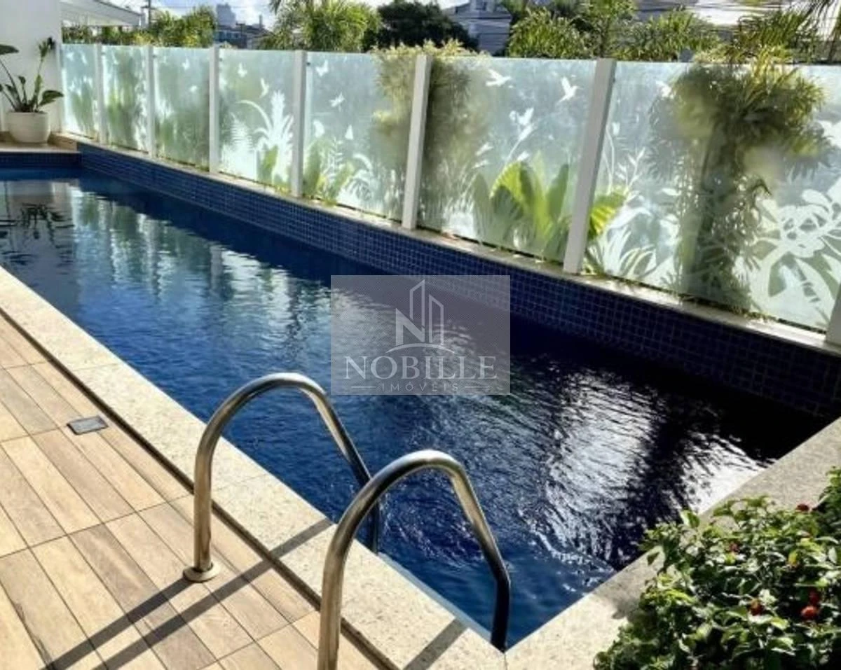 2-bedroom apartment in a building with a pool — photo 31