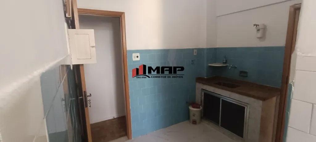 2-bedroom apartment with a compact kitchen and stove — photo 2