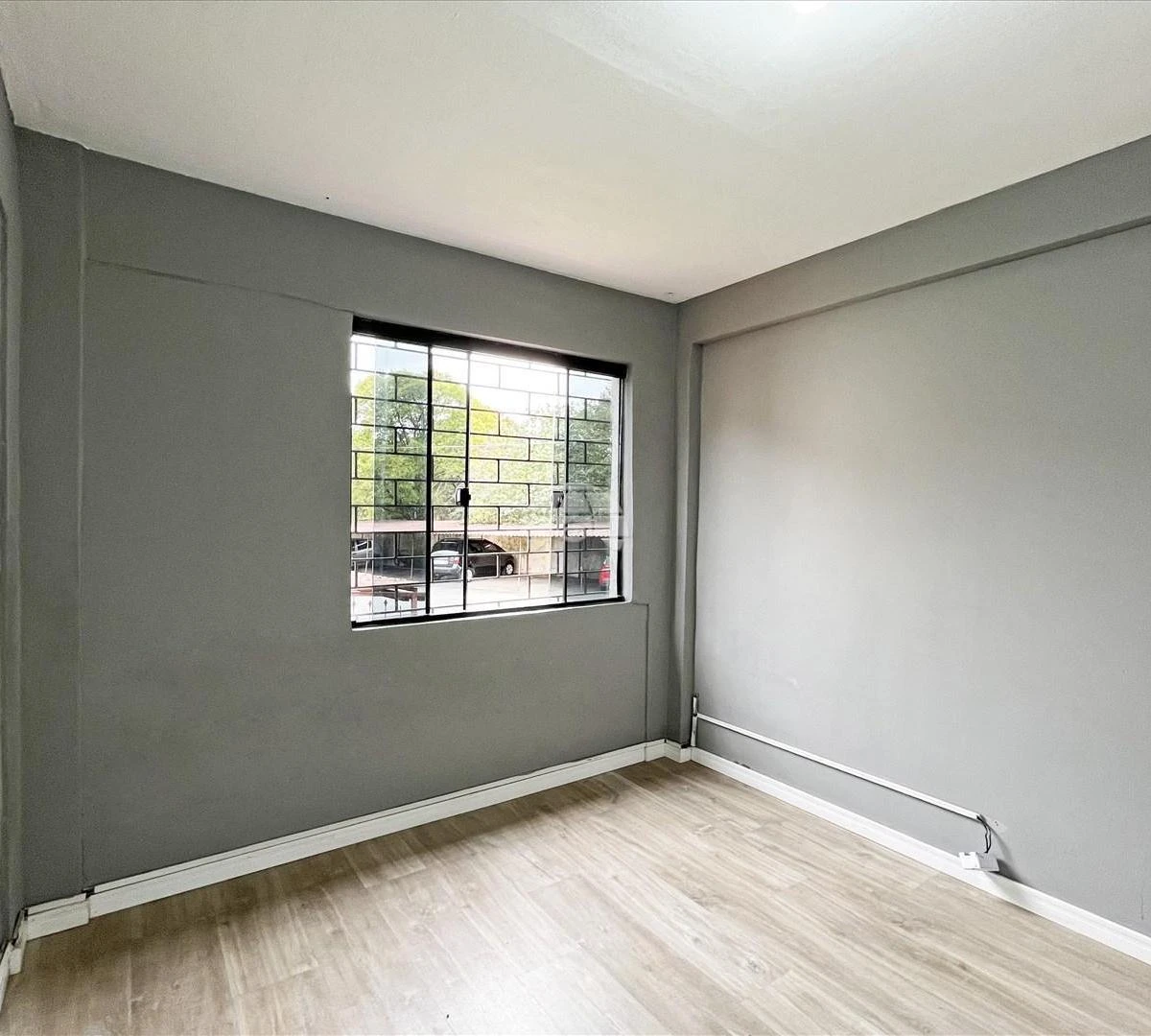 Wood or laminate floors in a 3-bedroom apartment, 48 m² — photo 7
