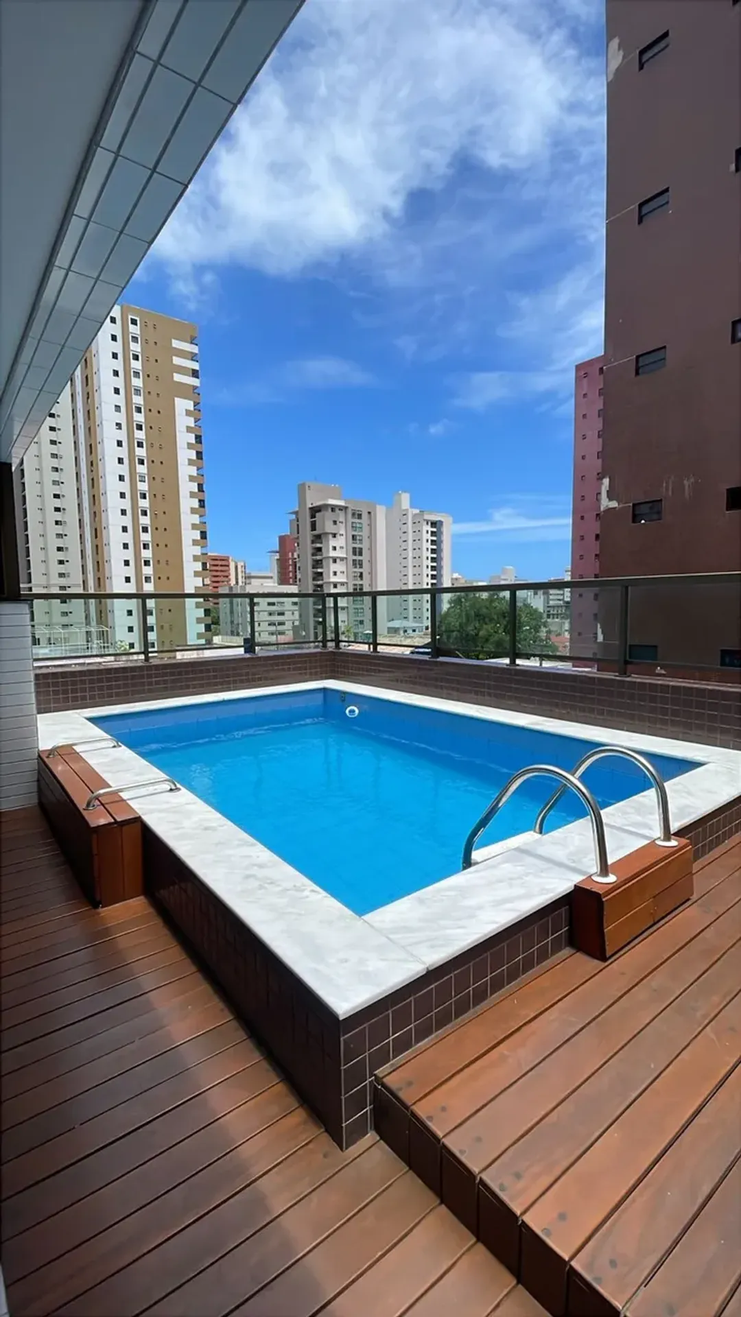 One-bedroom apartment in a building with a pool — photo 6