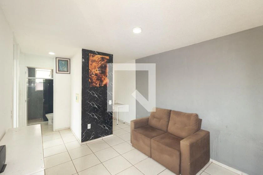 2-bedroom apartment in a building with a pool