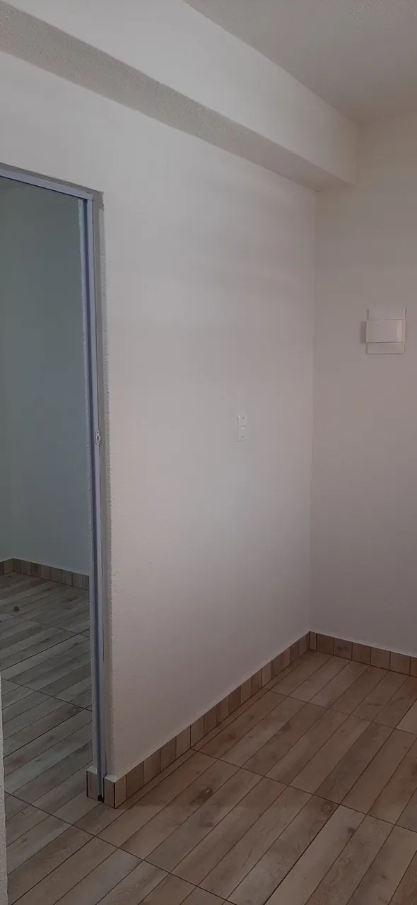 Studio-sized kitinete with 1 bedroom and compact kitchenette — photo 9