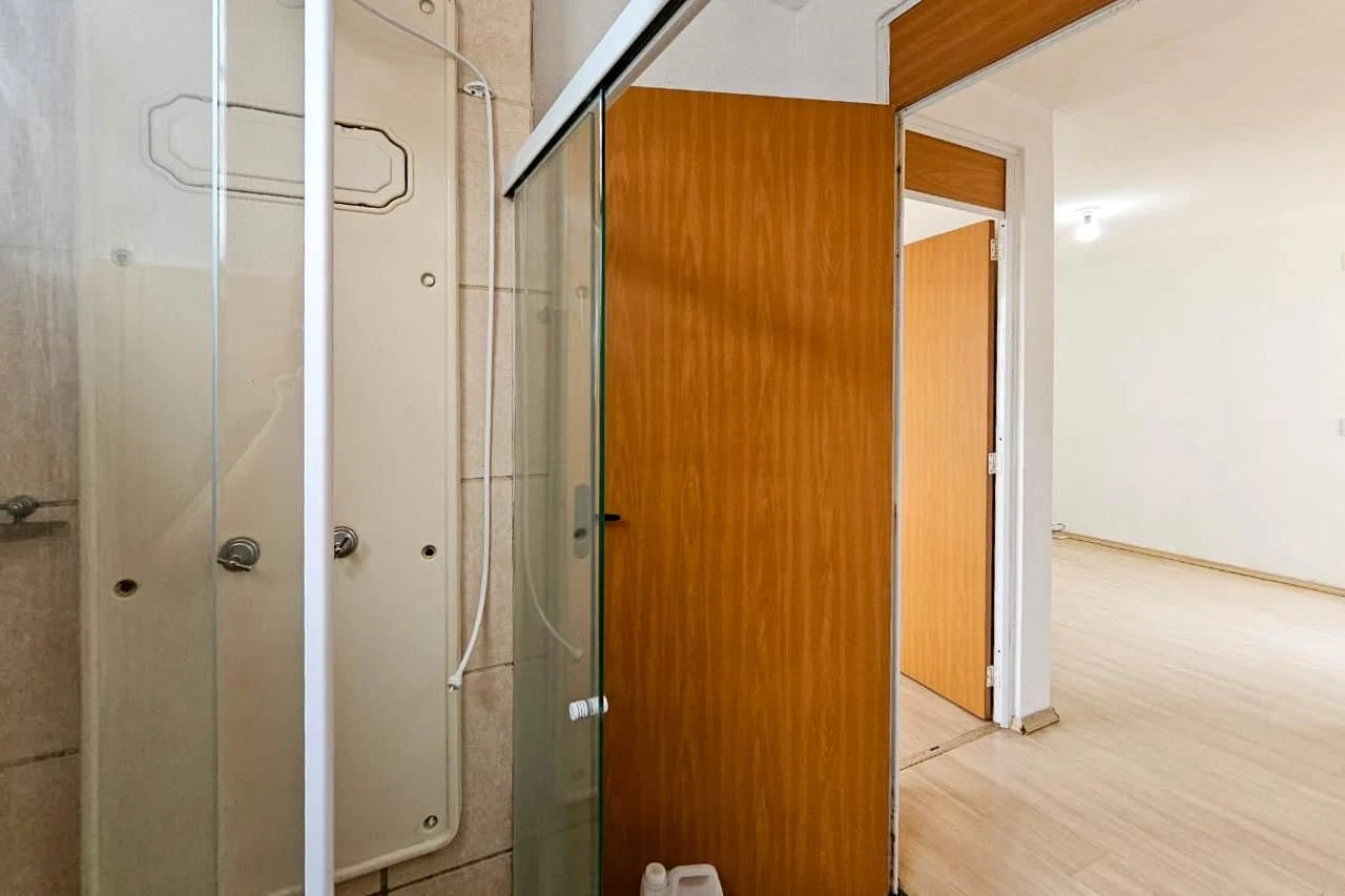2-bedroom apartment in a building with a pool — photo 39