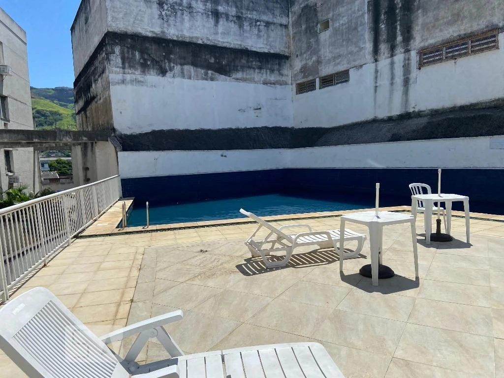 2-bedroom apartment in a building with a pool — photo 23
