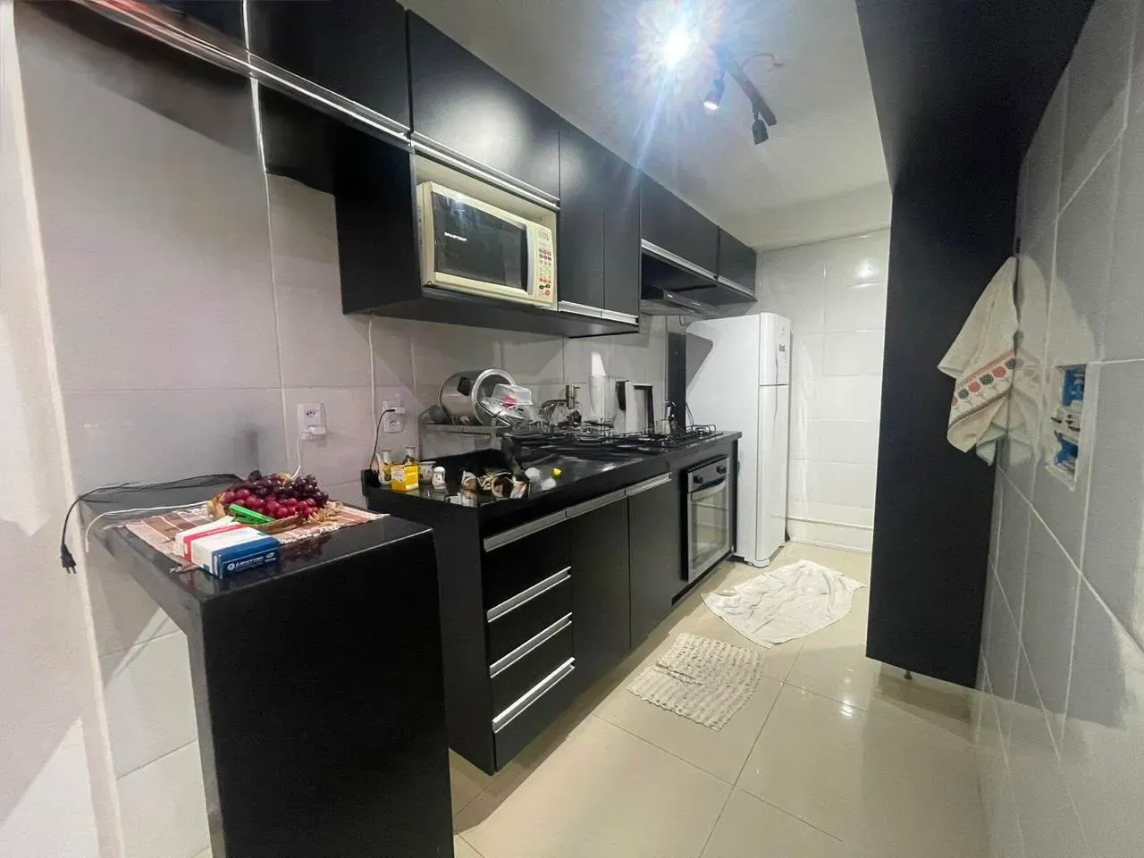2-bedroom apartment in a building with a pool — photo 2