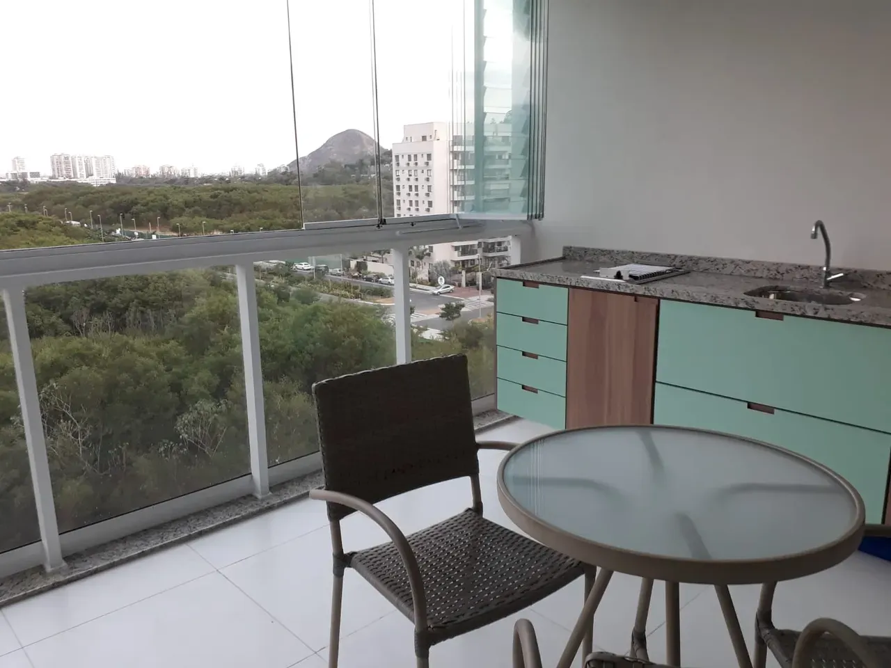 Balcony with a grill in a 2-bedroom apartment, 66 m² — photo 33