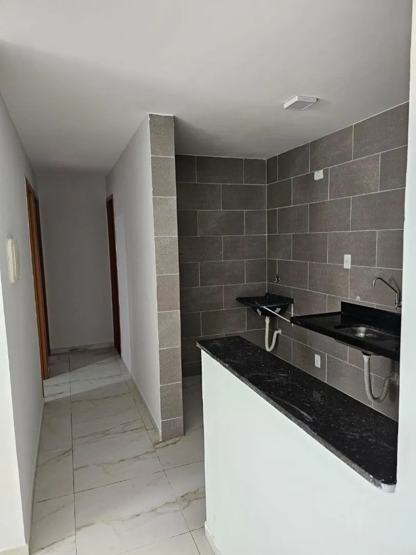 2-bedroom apartment in a building with a pool — photo 2