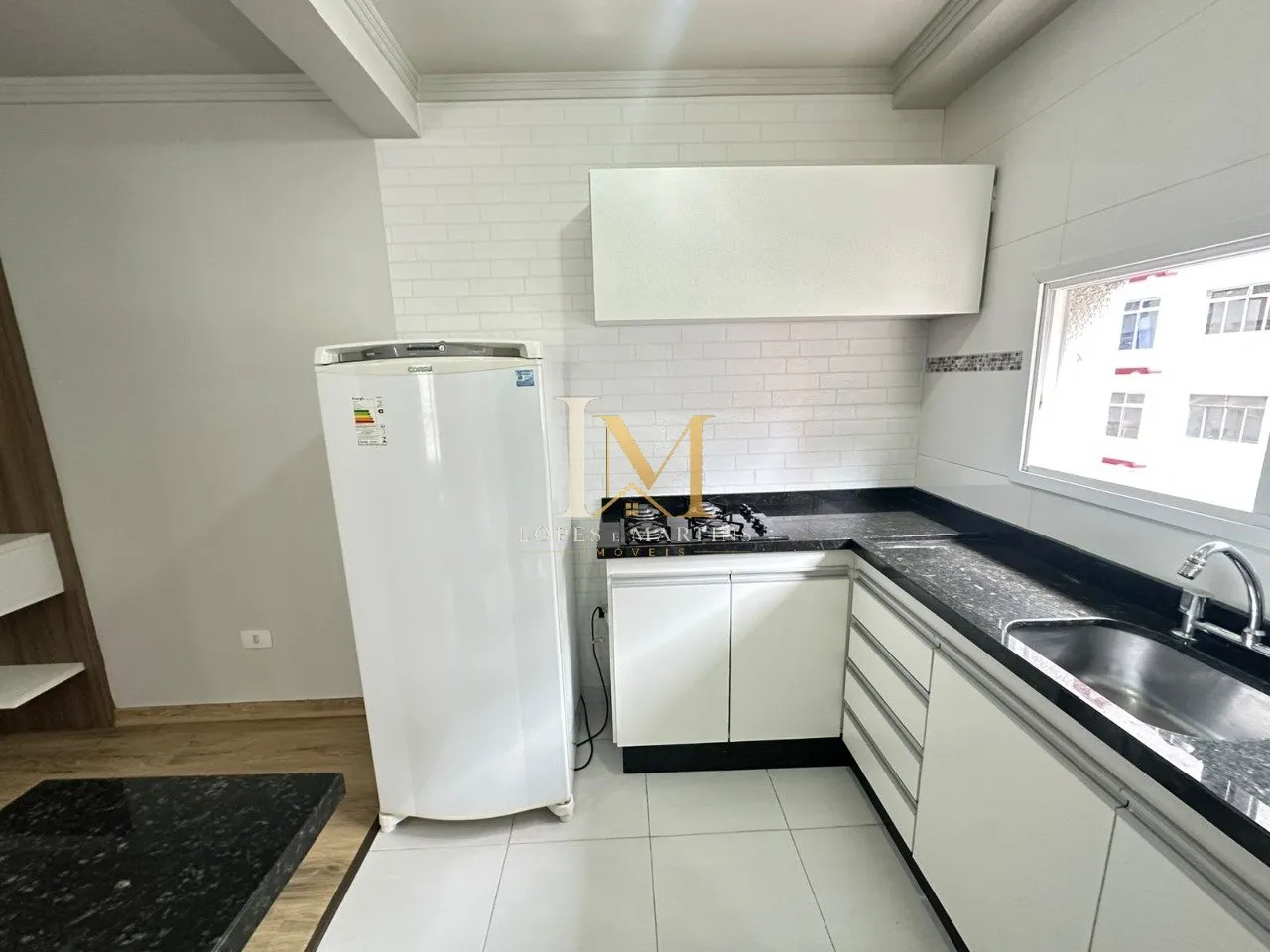 One-bedroom apartment with wood or laminate floors