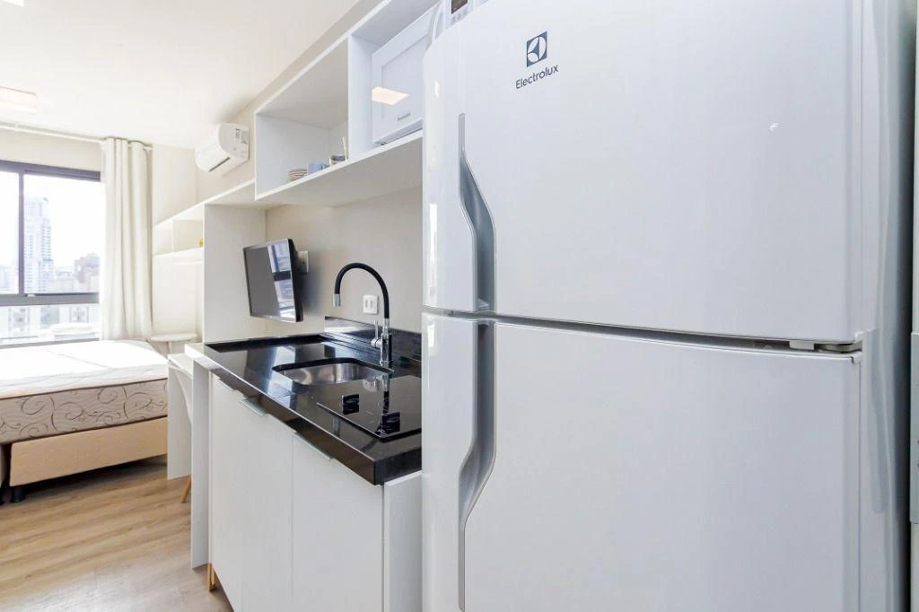 1 quarto e espaço de home office: apartamento de 17 m² — photo 17