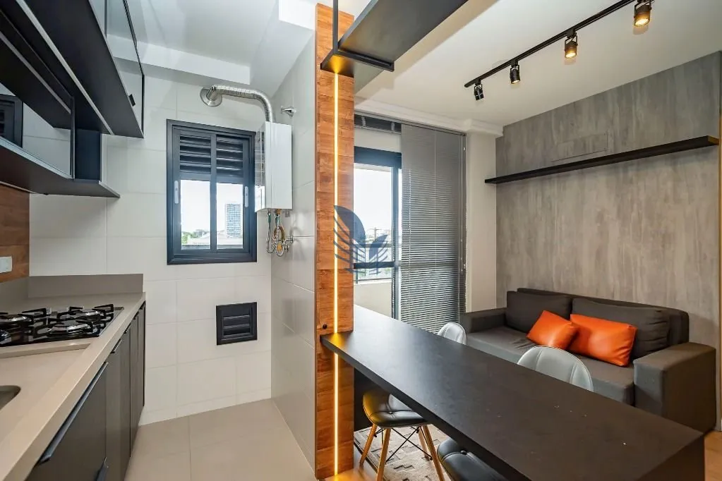 1-bedroom rental with open-plan kitchen and BBQ — photo 10