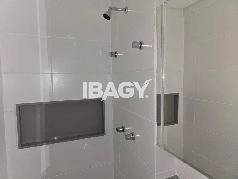 2-bedroom apartment in a building with a pool — photo 14