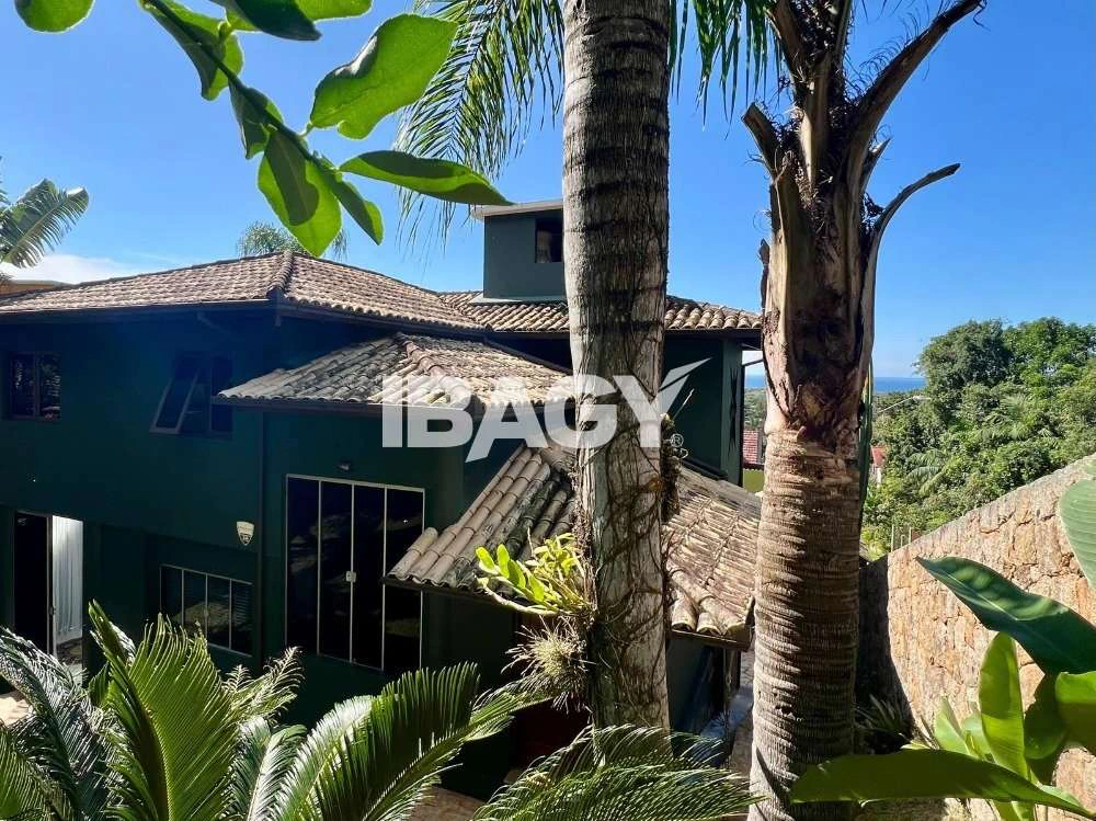 Casa com churrasqueira embutida na varanda e 3 quartos — photo 5